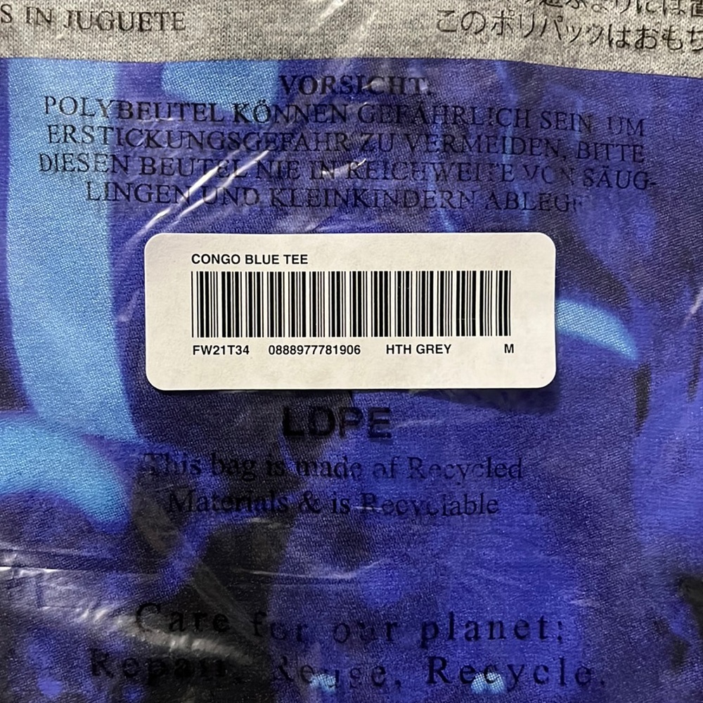 The Supreme America Eats Its Young T-shirt! a blue graphic image of Nas and DMX